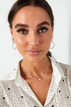 Elegant Multi-Layered Necklace in Silver and Gold