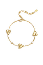 Armband mit drei massiven Herzen und Steinen