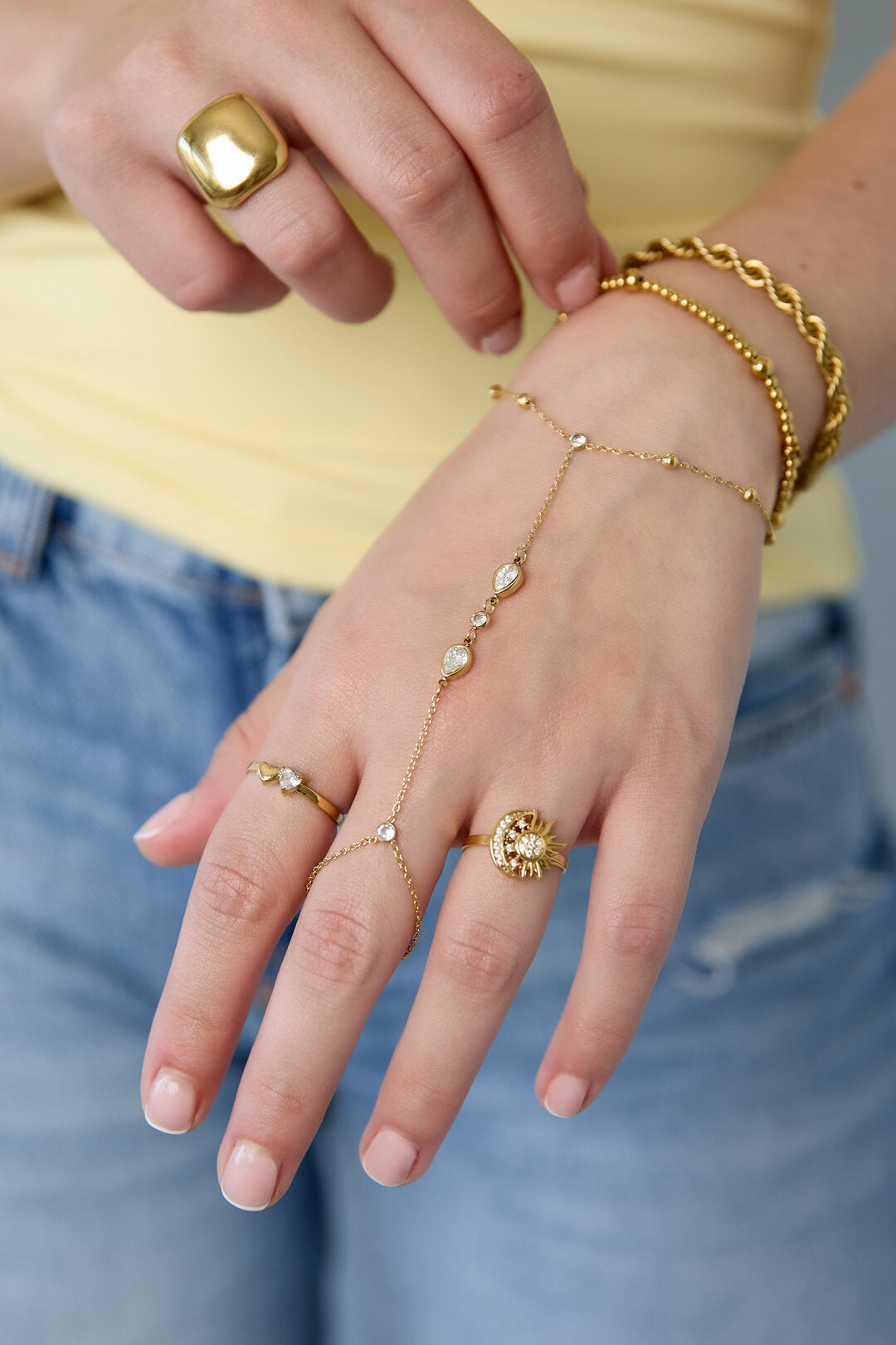 Handkette mit tropfenförmigen Statement-Steinen