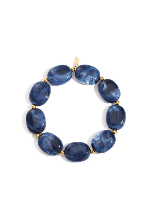 Perlenarmband mit ovalen und goldenen Perlen