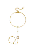 Handkette mit gerahmtem Statement-Stein
