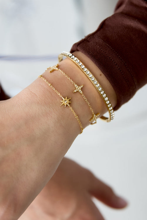 Armband mit Kleeblattmotiv und eingelegten Kleeblättern