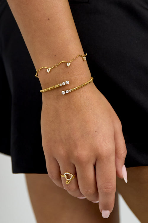 Armband mit Zickzackmuster und Steinen